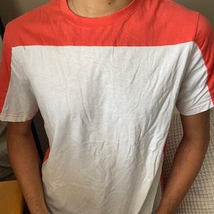 Salmon pink/orange and white short sleeve t-shirt.